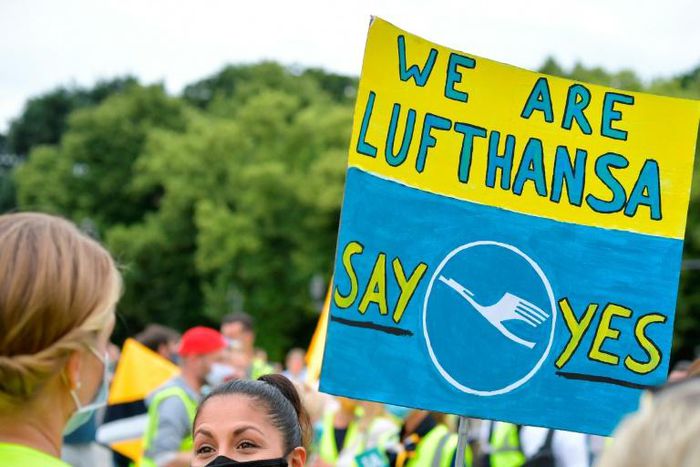 Employees of German airline Lufthansa hit the streets to encourage shareholders to back a bailout plan