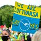 Employees of German airline Lufthansa hit the streets to encourage shareholders to back a bailout plan