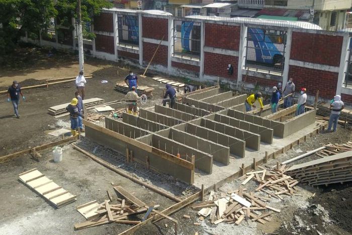 Workers build new graves in a cemetery in Guayaquil, Ecuador, on April 12 2020