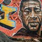 A mural of George Floyd, whose US police killing has sparked worldwide protests against police brutality, in Nairobi's Kibera slum