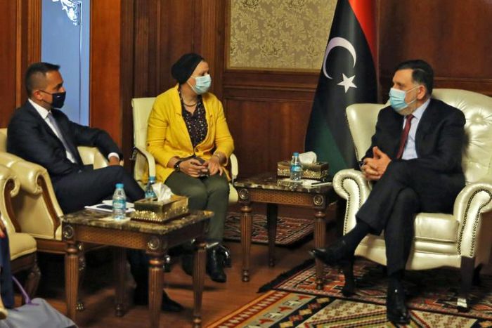 Di Maio (L) met Sarraj (R) during his first visit to war-torn Libya since January