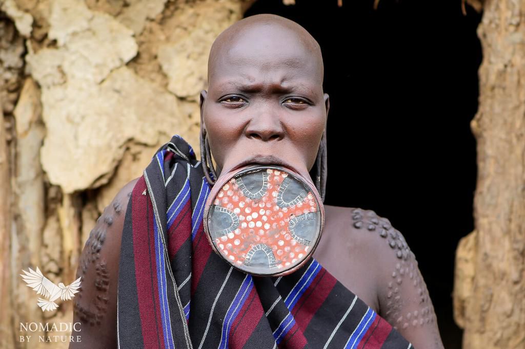 Why girls of the Mursi tribe must remove their teeth and stretch their lips before they marry