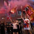 Fans celebrate outside Anfield