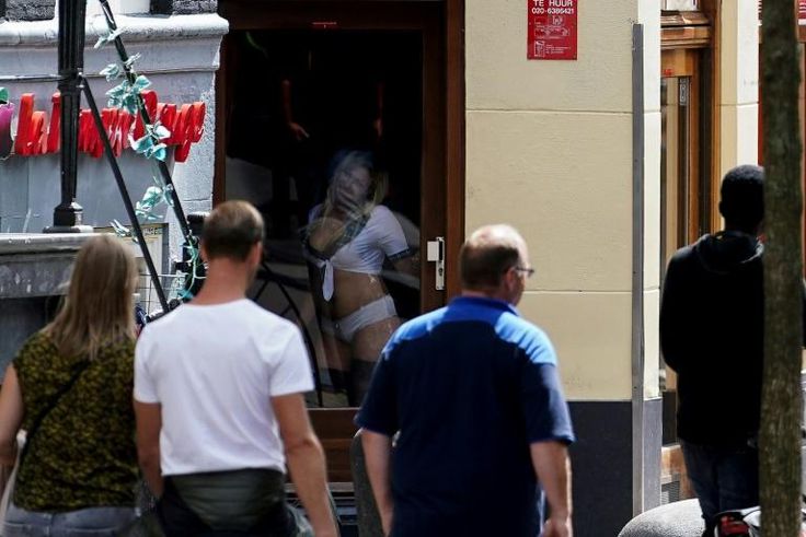 Amsterdam's famous red light district on Wednesday after it reopened its doors