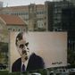 Four alleged members of Hezbollah were on trial in absentia in the Netherlands over the huge Beirut suicide bombing in 2005 that killed former Prime Minister Rafic Hariri, pictured here on a billboard in the Lebanese capital