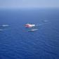 The Turkish Oruc Reis research ship, accompanied by a small navy fleet, sails into disputed Mediterranean waters