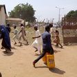 Taraba residents invade COVID-19 palliatives warehouse in Jalingo to loot food items.
