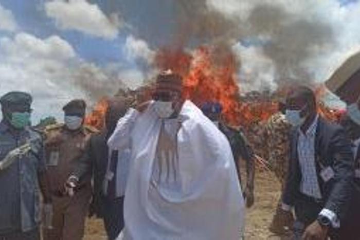 Gov. Babagana Zulum of Borno and other head of security agencies at the scene of the drug burning. [NAN]