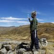 Alvaro Cabrera, 10, searches for a cellphone signal atop a hill near Manazo, Peru while trying to take part in a virtual class; the UN says Covid-19 and school closures have left millions of children worldwide unable to access distance education