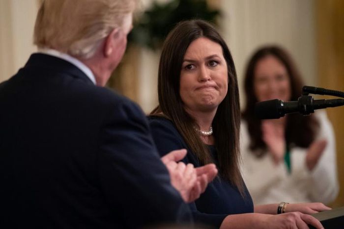 Sarah Sanders, then the White House press secretary, seen in June 2019 at the White House with President Donald Trump