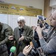 Russian historian Yury Dmitriyev (pictured April 2018), who heads rights group Memorial's branch in Karelia, speaks to the media as he leaves a court following the verdict in his child pornography trial in the northwestern city of Petrozavodsk