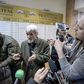 Russian historian Yury Dmitriyev (pictured April 2018), who heads rights group Memorial's branch in Karelia, speaks to the media as he leaves a court following the verdict in his child pornography trial in the northwestern city of Petrozavodsk