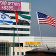 The national flags of (L-R) Bahrain, Israel, the United Arab Emirates, and the United States are flown along a road in Israeli resort city of Netanya after the two Gulf countries agreed to normalise ties with the Jewish state