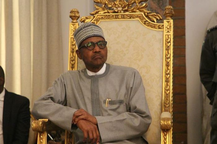 Nigerian president Muhammadu Buhari (pictured February 2020) reportedly the head of the African Development Bank that the country "will stand solidly behind" him in his bid to remain at the helm of the bank