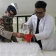 Staff at a Bali university have turned 4,000 litres of local palm wine into a hand sanitiser to protect residents of the holiday island against the coronavirus