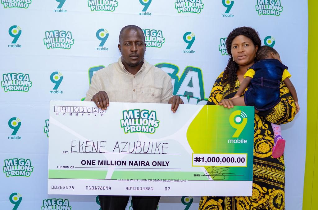 Ekene Azubuike, 1million Naira winner and a family member in the ongoing 9mobile Mega Millions Promo prize presentation in Kano