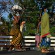 Stranded migrants in Chennai, in southeastern India, prepare to board a special train after the government eased a nationwide coronavirus lockdown