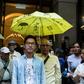 Pro-democracy activist Nathan Law (C) says he has relocated to Britain after fleeing Hong Kong because of a tough new security law imposed by Beijing