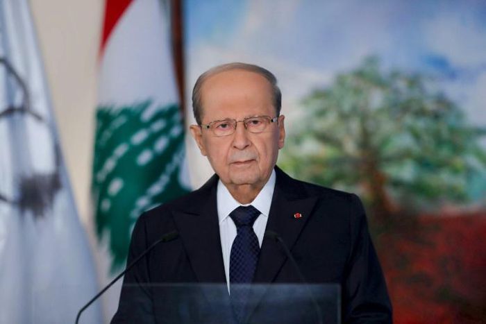 A handout picture provided by the Lebanese photo agency Dalati and Nohra shows President Michel Aoun delivering a televised address to mark the upcoming centenary of the Lebanese state