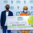 Babangida Mukaddas, 9mobile Senior Manager Sales and Distribution; Florence Aaron, 1million Naira winner and Abdullahi Ibrahim, 9mobile Experience Center Manager in the ongoing 9mobile Mega Millions Promo prize presentation in Kano