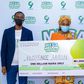 Babangida Mukaddas, 9mobile Senior Manager Sales and Distribution; Florence Aaron, 1million Naira winner and Abdullahi Ibrahim, 9mobile Experience Center Manager in the ongoing 9mobile Mega Millions Promo prize presentation in Kano