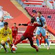 Burnley goalkeeper Nick Pope (left) kept Liverpool at bay