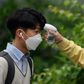 Hundreds of thousands of South Korean students have returned to school after a delay of more than two months because of the coronavirus outbreak