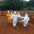 Workers carry a coffin of a coronavirus victim for burial at a cemetery in Jakarta. City officials have noted a huge increase in the number of burials, a rise not reflected by government virus death tolls