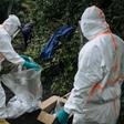 Two staff members of the Congolese Ministry of Health pack their equipment after performing a COVID-19 test at a private residence in Goma, northeastern Democratic Republic of Congo, on March 31, 2020