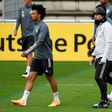 Germany head coach Joachim Loew (centre) oversees training in Stuttgart alongside Leroy Sane (left) and Kai Havertz (right).