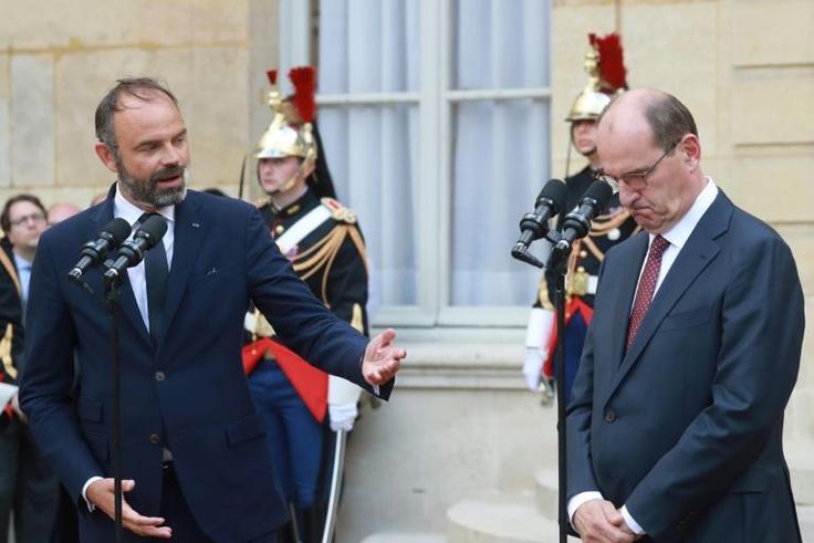 As Edouard Philippe (left) handed the prime ministerial mantle to Jean Castex (right) in Paris some analysts saw President Macron as tightening his own power grip