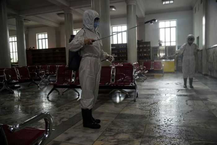 Officials busily sprayed disinfectants as a preventive measure at the capital's railway station