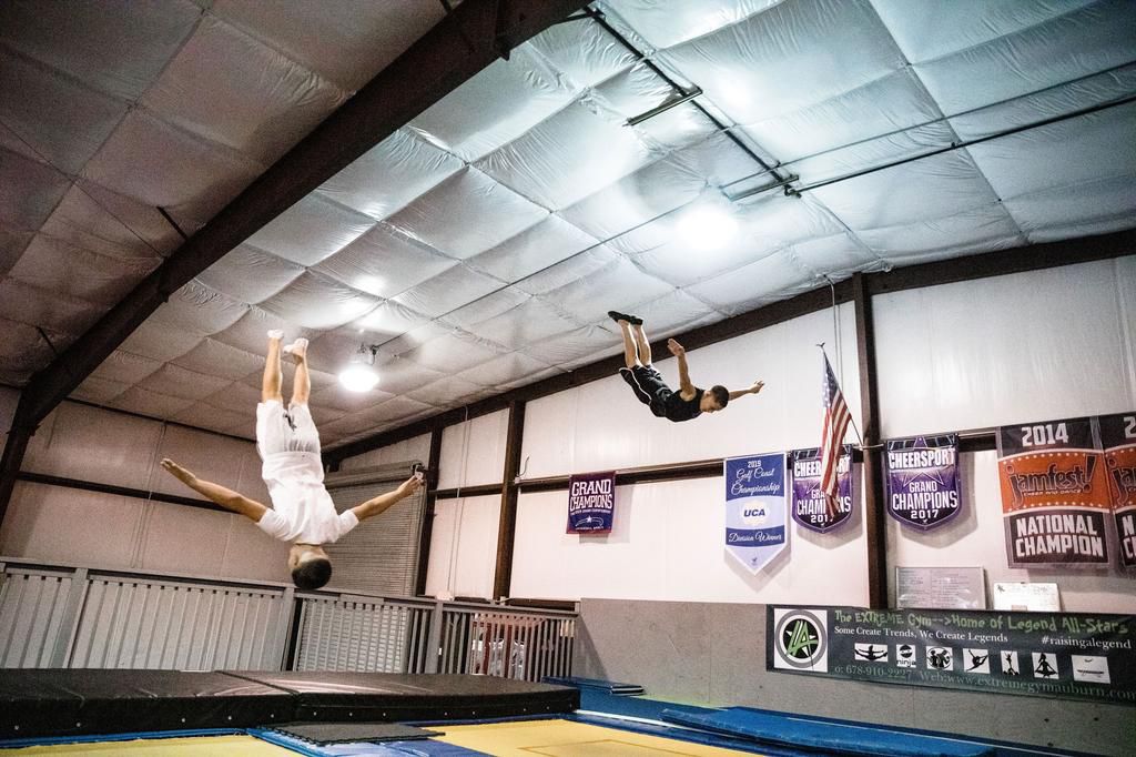 Walton (right in the black) trains with his brother Jaden (foreground) at the Extreme Tumbling Training Center in Winder, Georgia on October 26, 2019.