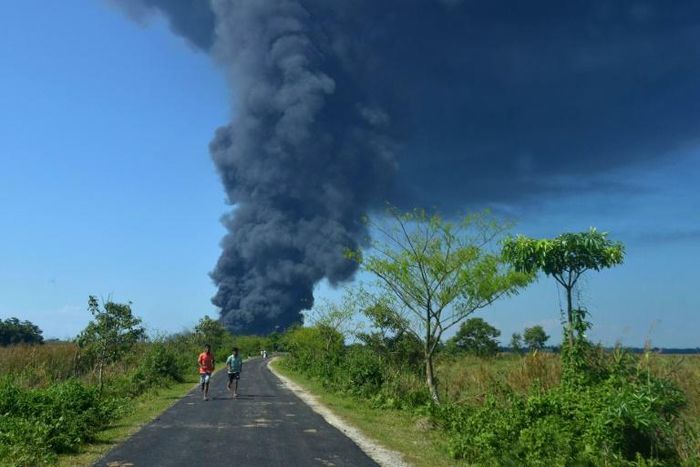 The explosion sent bright orange flames and huge, black plumes of smoke high into the sky