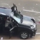 Hoodlums and some men in black suit driving towards protesters in Abuja (The Cable)