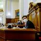 Ukrainian President Volodymyr Zelensky (R) attended the historic session of parliament