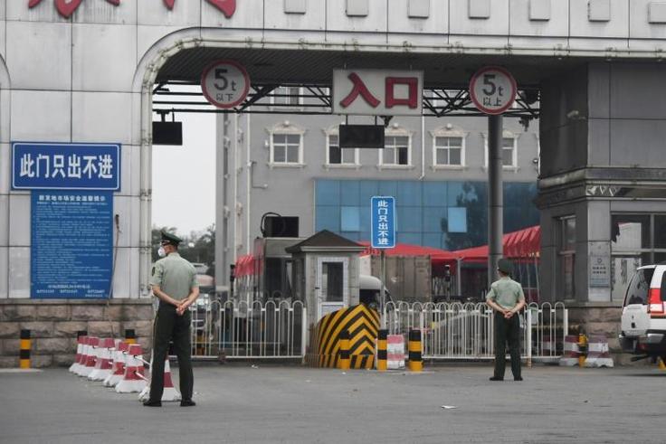 Chinese officials have closed the Xinfadi wholesale market, which has been linked to a new cluster of coronavirus cases