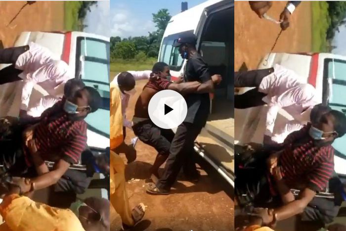 Angry officials tie up stubborn COVID-19 patient with rope before dumping him in ambulance (video)