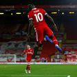 Liverpool's in-form Senegalese forward Sadio Mane has tested positive for Covid-19 and is self-isolating, the club said Friday