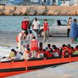 Italian coast guard rescued some migrants from a humanitarian ship and brought them to Lampedusa