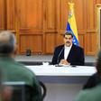 President Nicolas Maduro, shown in a handout picture released by the Venezuelan Presidency speaking to members of the Bolivarian National Armed Forces (FANB), announced that two Americans were arrested for taking part in the failed "invasion"