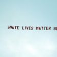 The start to Manchester City's Premier League match against Burnley on Monday was marred by a plane flying overhead with a banner reading "White lives matter Burnley"