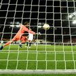All over: Sevilla's Luuk De Jong scores past Manchester United goalkeeper David de Gea