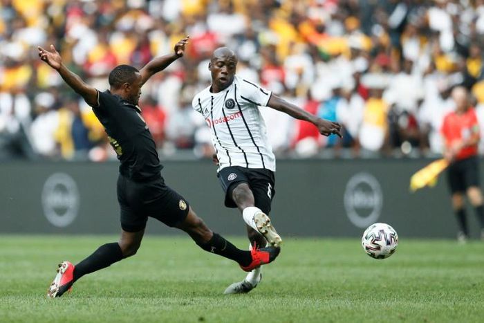 Ben Motshwari (R) of Orlando Pirates has made a full recovery after testing positive for COVID-19
