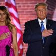 President Donald Trump and his wife, Melania, listen to the US national anthem during the third night of the Republican National Convention