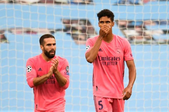 'Blame me': Real Madrid's French defender Raphael Varane (right) reacts after Manchester City's Raheem Sterling opened the scoring