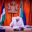 President Buhari signs PIB into law