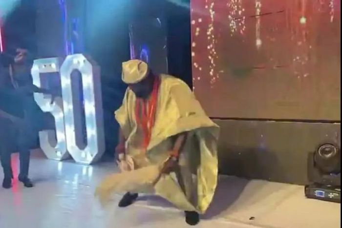 Comedian AY Makun dancing with King Sunny Ade at his birthday party