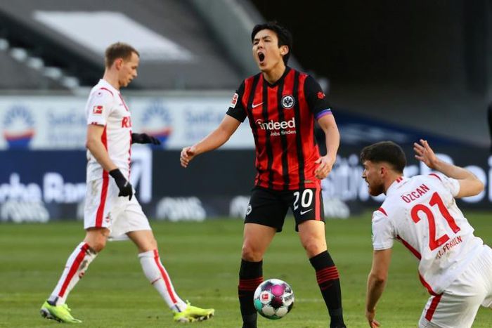 Frankfurt's Japanese captain Makoto Hasebe (C) celebrates their 2-0 win over Cologne last Sunday