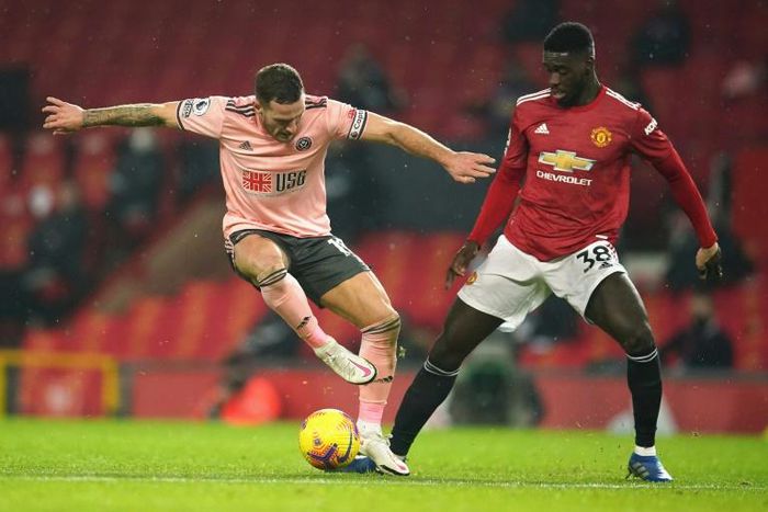 Axel Tuanzebe (right) suffered racial abuse online after Manchester United's defeat by Sheffield United